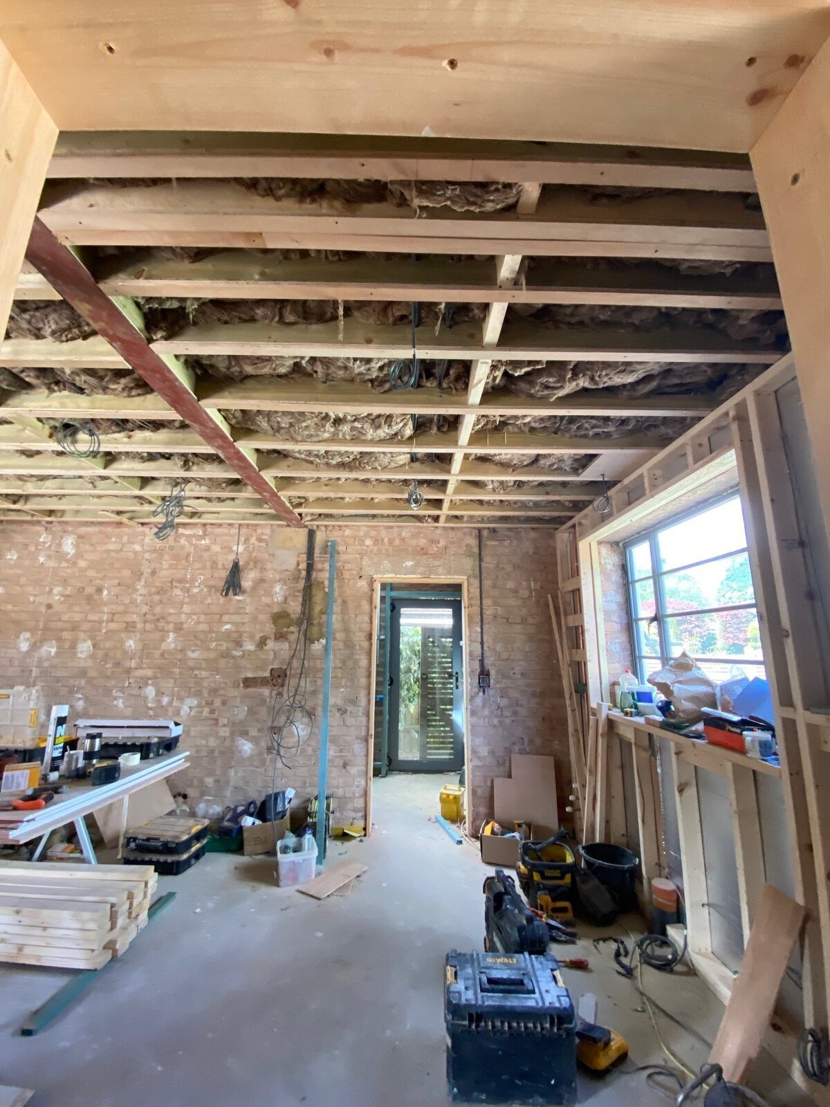 Renovation first fix interior with timber frame ceiling