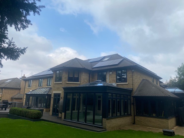 Large residential property with solar array and orangery